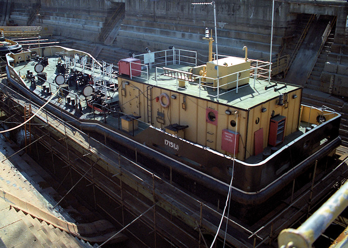 Photograph of the vessel RMAS 1715(U) pictured in dry dock in Portsmouth Naval Base on 29th August 1988