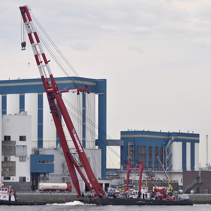 Photograph of the vessel  Amsterdam pictured passing Vlaardingen under tow on 28th June 2011