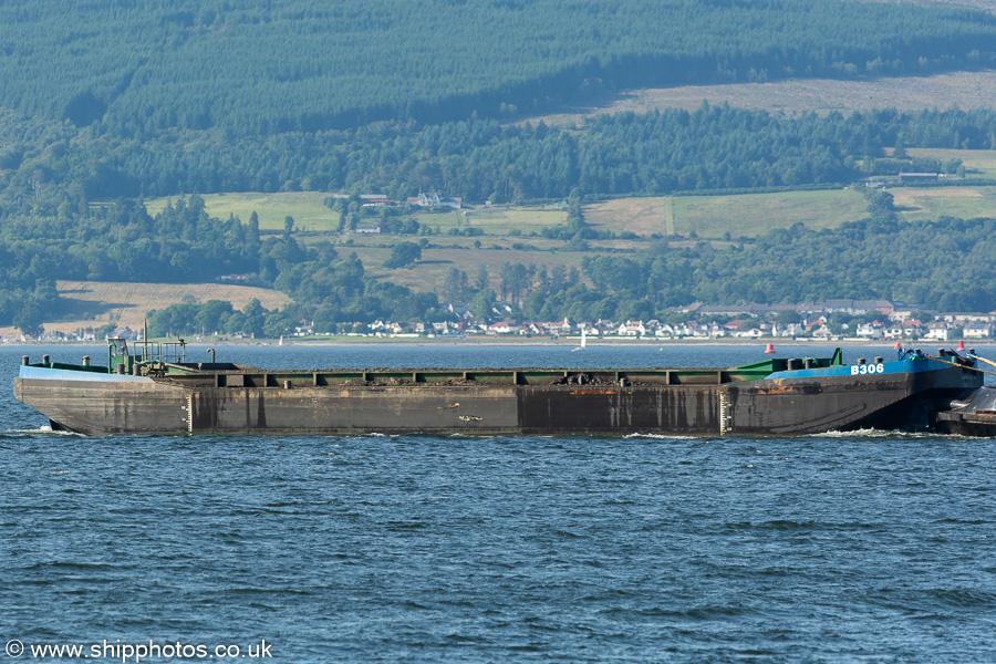 B306 pictured passing Greenock under tow on 15th July 2021