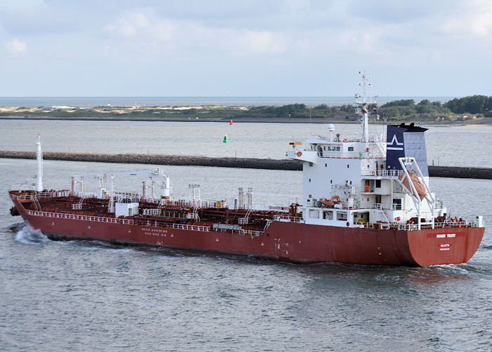 Photograph of the vessel  Bremen Trader pictured departing Rotterdam on 24th June 2011