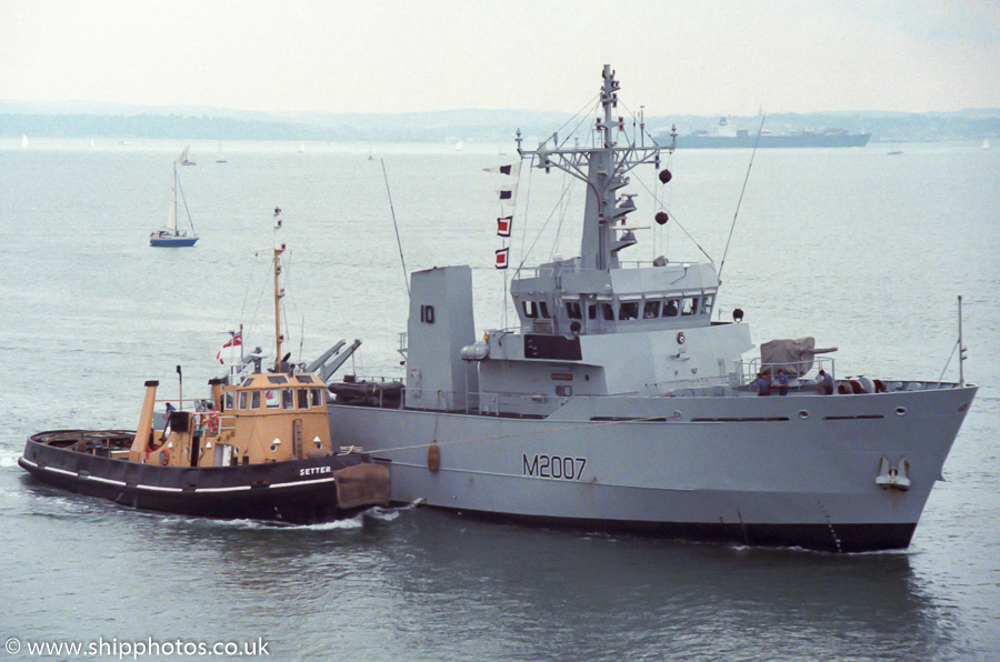 Photograph of the vessel HMS Humber pictured arriving under tow in Portsmouth Harbour on 2nd July 1989