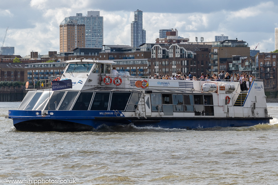 Photograph of the vessel  Millennium City pictured passing Rotherhithe on 20th July 2025