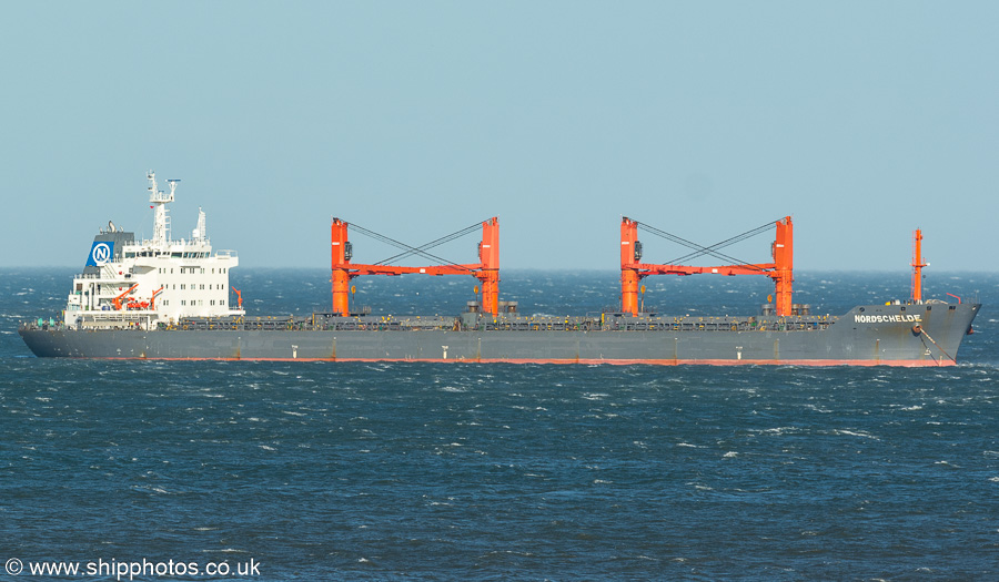 Photograph of the vessel  Nordschelde pictured at anchor off Tynemouth on 6th April 2024