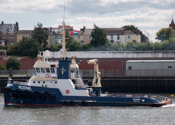 Photograph of the vessel  Norne pictured departing the River Tyne on 24th August 2014