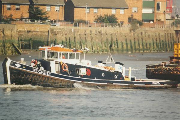 Photograph of the vessel  Recruit pictured on the Thames passing Greenwich on 13th February 1998