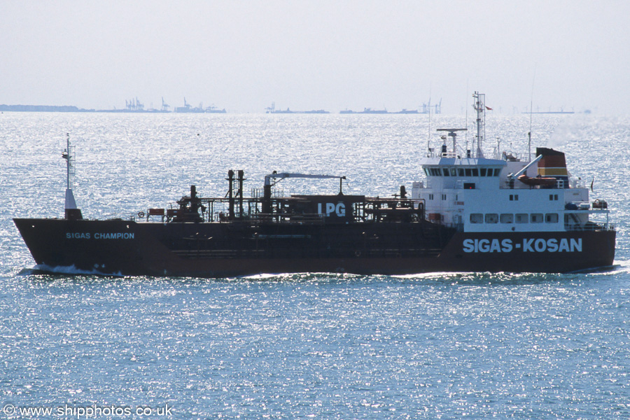 Photograph of the vessel  Sigas Champion pictured on the Westerschelde passing Vlissingen on 21st June 2002