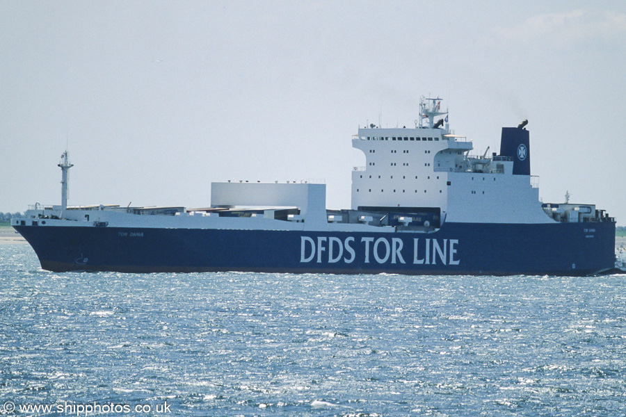 Photograph of the vessel  Tor Dania pictured on the Westerschelde passing Vlissingen on 21st June 2002