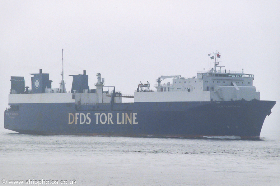 Photograph of the vessel  Tor Flandria pictured on the Westerschelde passing Vlissingen on 19th June 2002