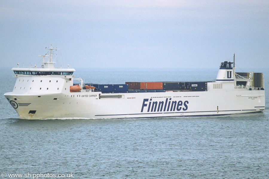 Photograph of the vessel  United Carrier pictured on the Westerschelde passing Vlissingen on 22nd June 2002